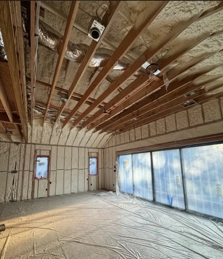 Interior walls and ceiling insulated with spray foam during new construction in Big Bear City